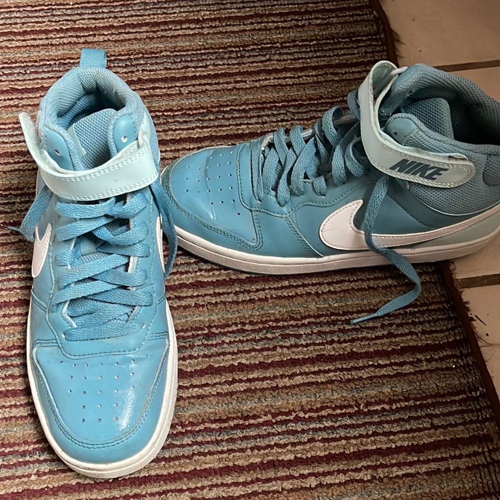 Nike mid high top sneakers women’s size 7, kids size 5.5